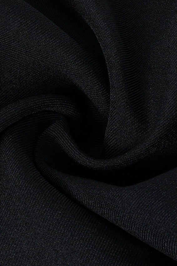 Back view showing the fitted shape and asymmetric hemline