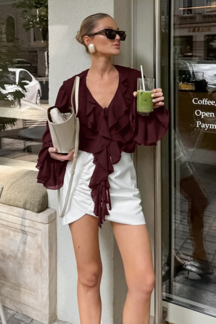 Women's blouse showing elegant flared cuffs