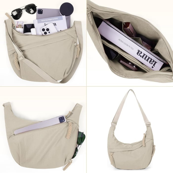 Angled view of women's crossbody bag showing zipper details and strap