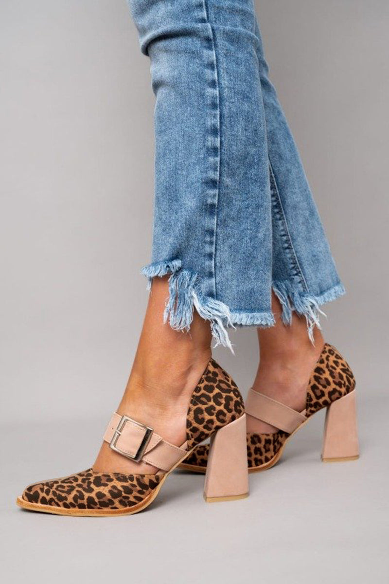 Women's strapped block heel pumps displayed from the front