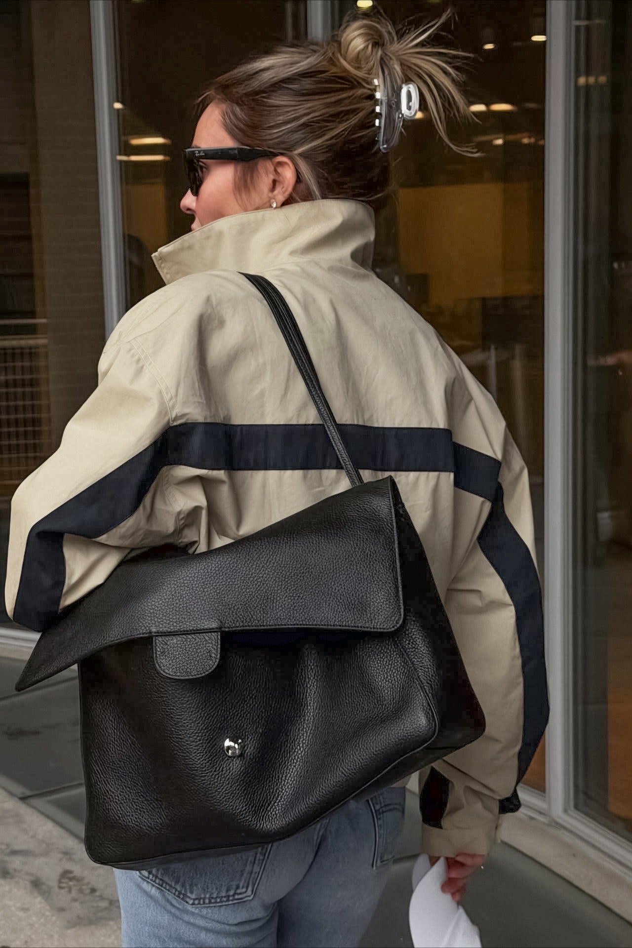 Close-up of the stand collar and zipper on a color block jacket