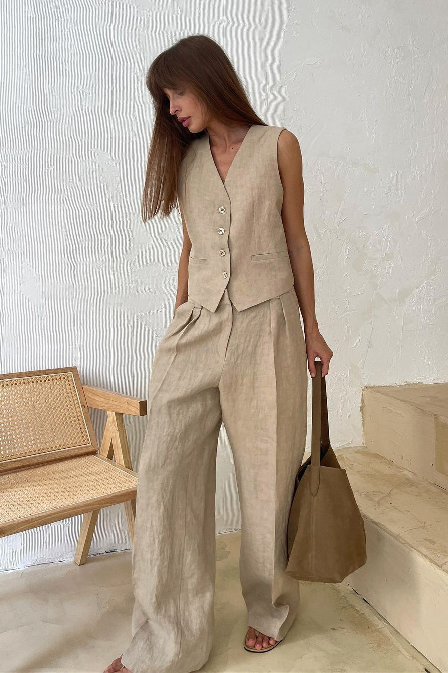 Front view of a relaxed linen blend pants and vest set