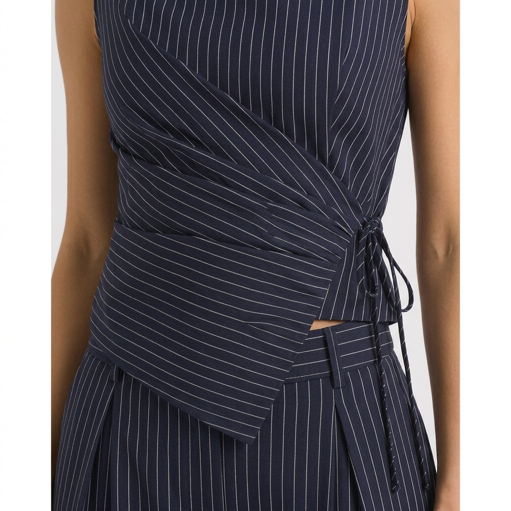 Two-piece pinstripe pants set shown in a polished, tailored look
