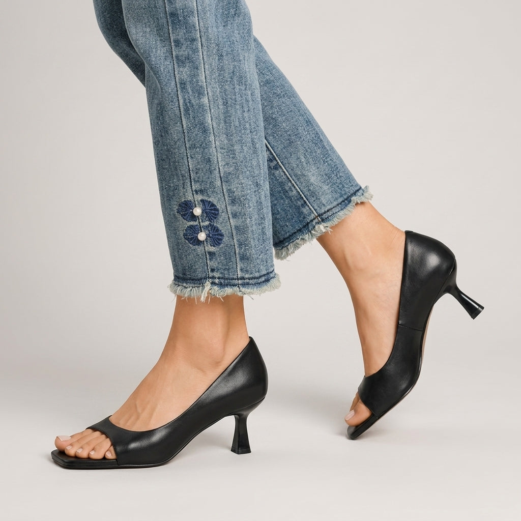 Close-up of the open square toe on block heel mules