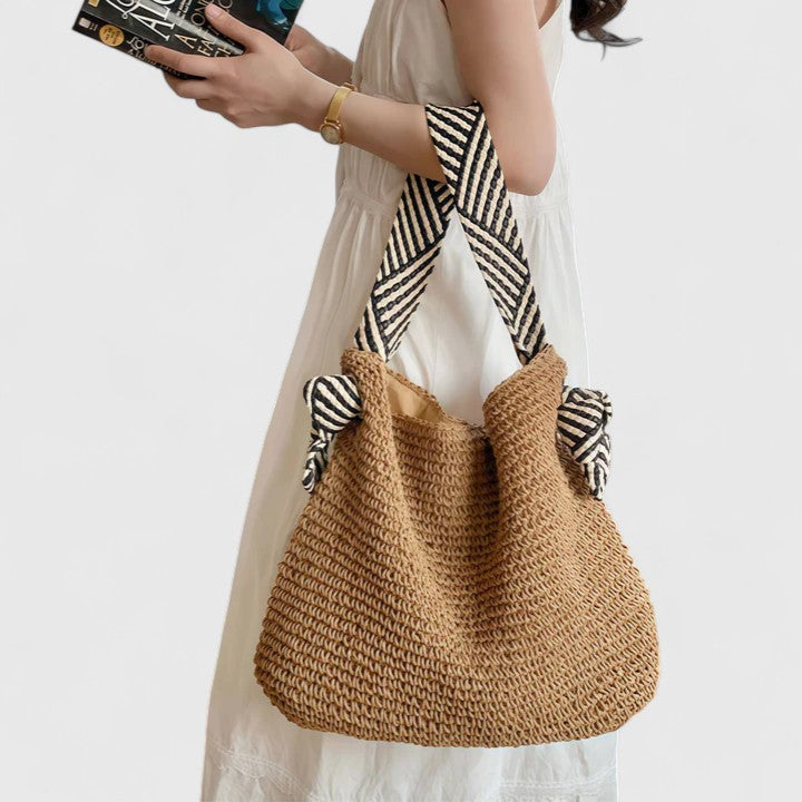 Braided shoulder tote bag shown from the front