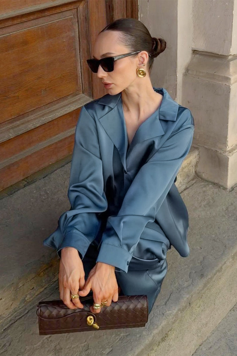 Women's lounge outfit featuring a collared satin shirt and wide-leg pants