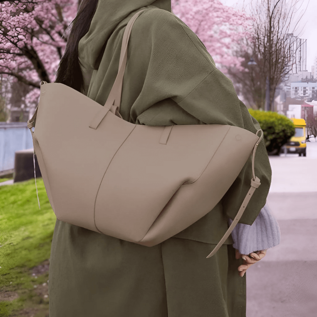 Side view of vegan leather crossbody bag with compact everyday silhouette