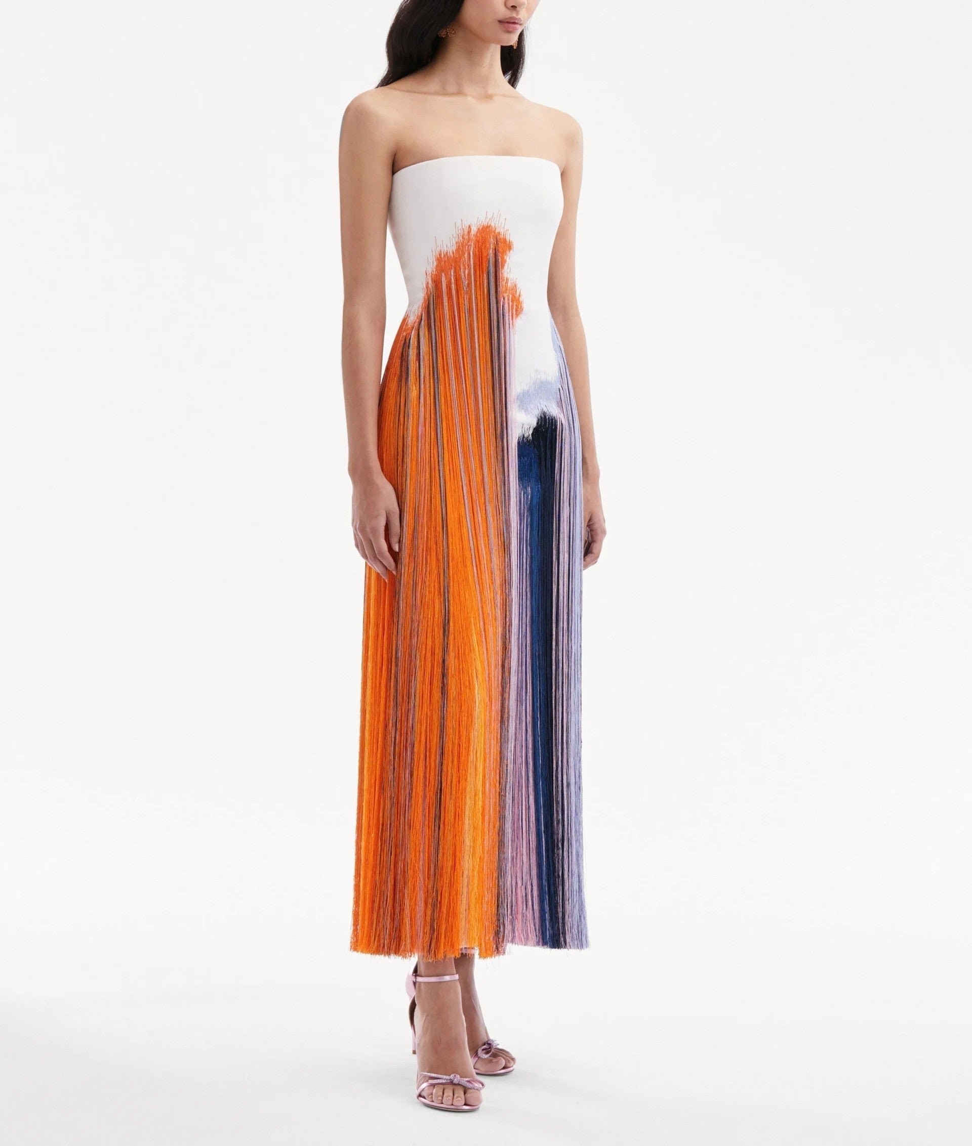 Front view of a women's midi dress with decorative fringe
