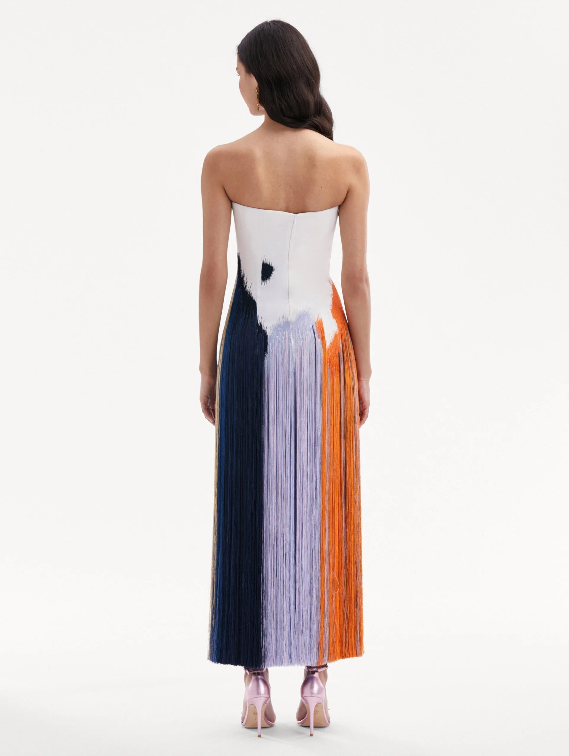Fringe detailing along the hem of a women's midi dress