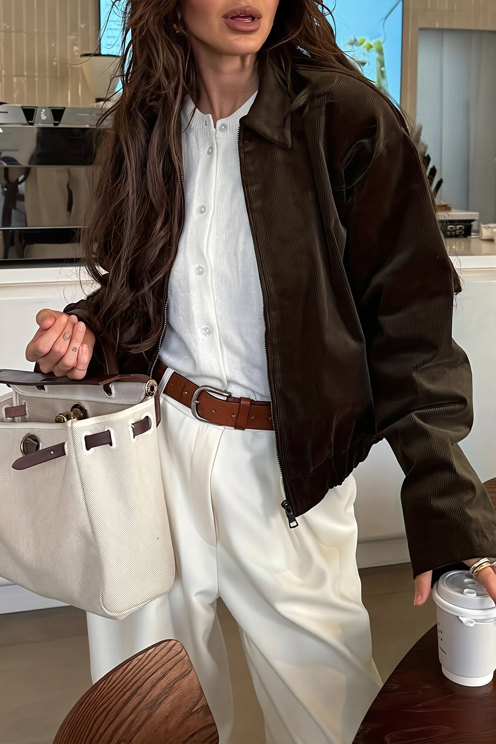 Corduroy bomber jacket shown from the front with a point collar