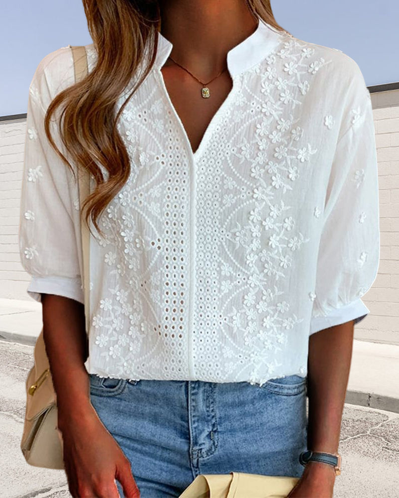 Front view of an elegant women's blouse with puff sleeves