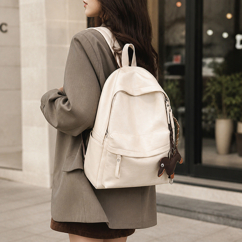 Spacious leather backpack with adjustable shoulder straps