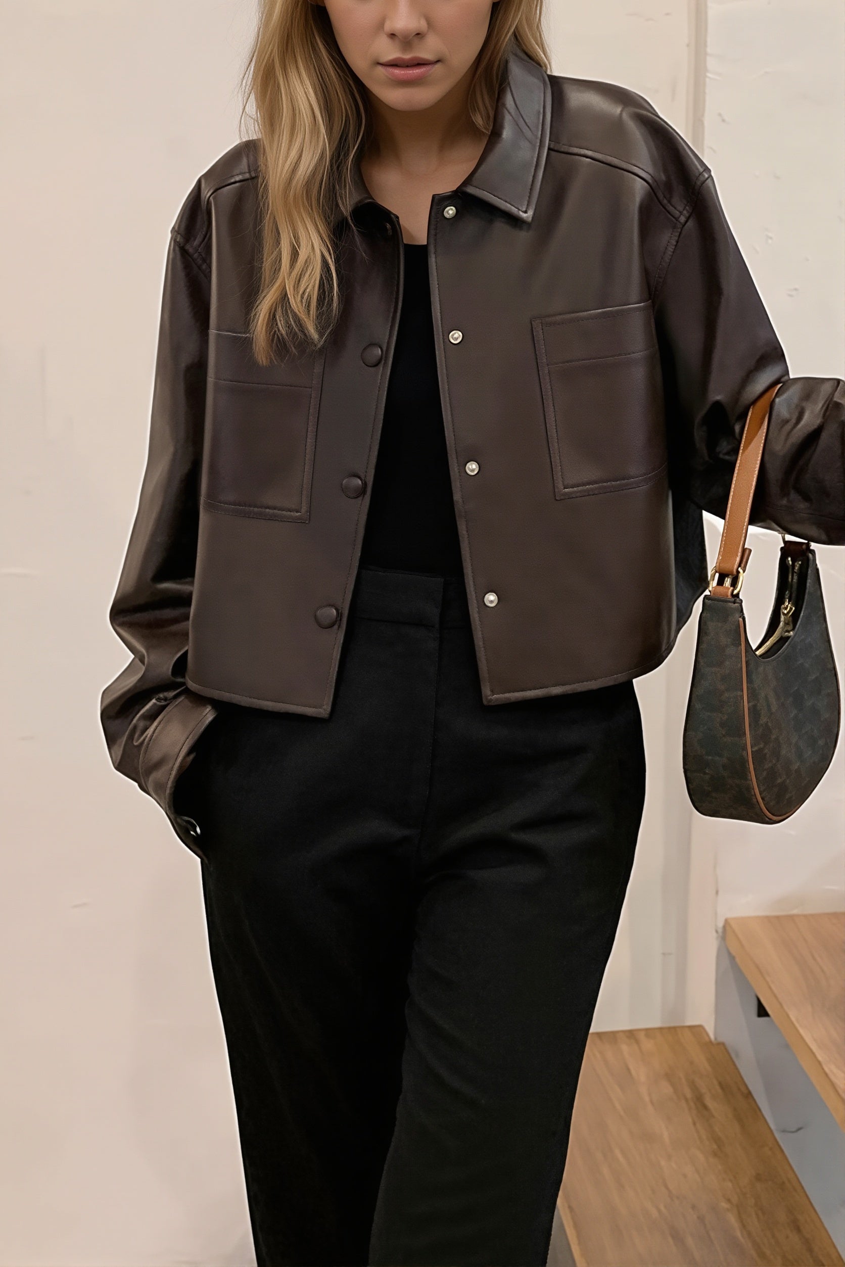 Cropped faux leather shirt jacket with button front and collar