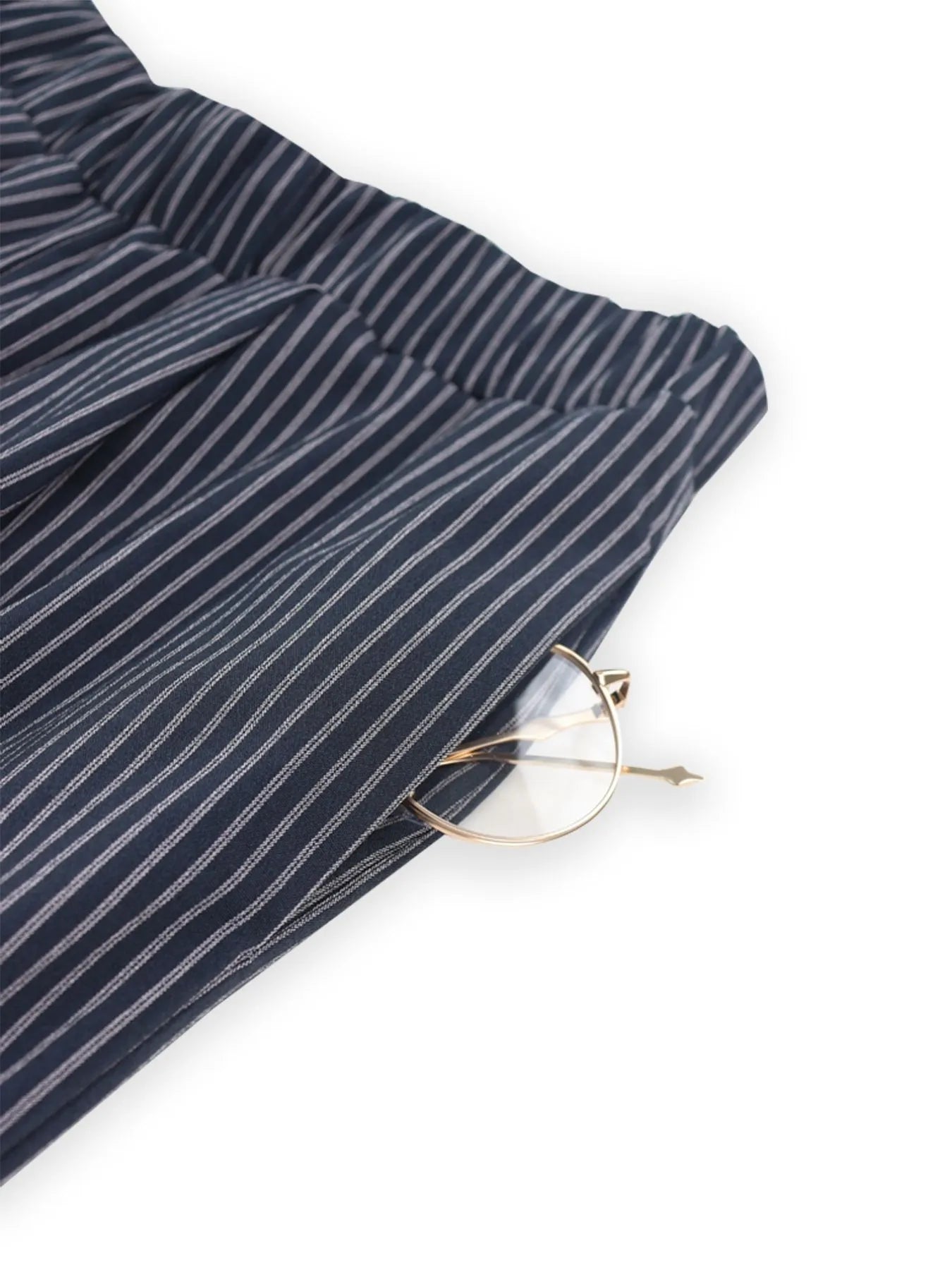 Full-length view of the striped two-piece outfit