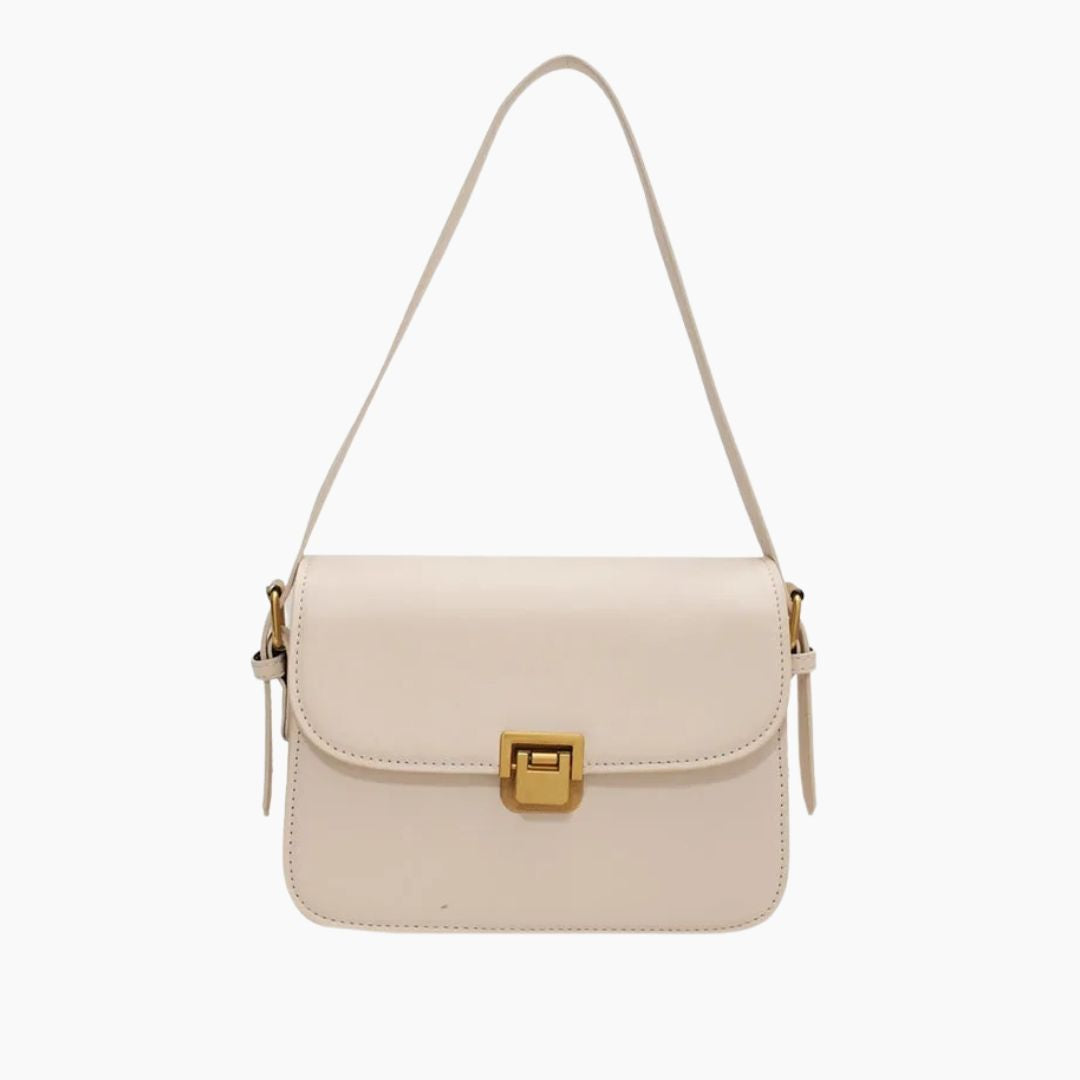 Structured leather shoulder bag for women shown in a clean studio setting