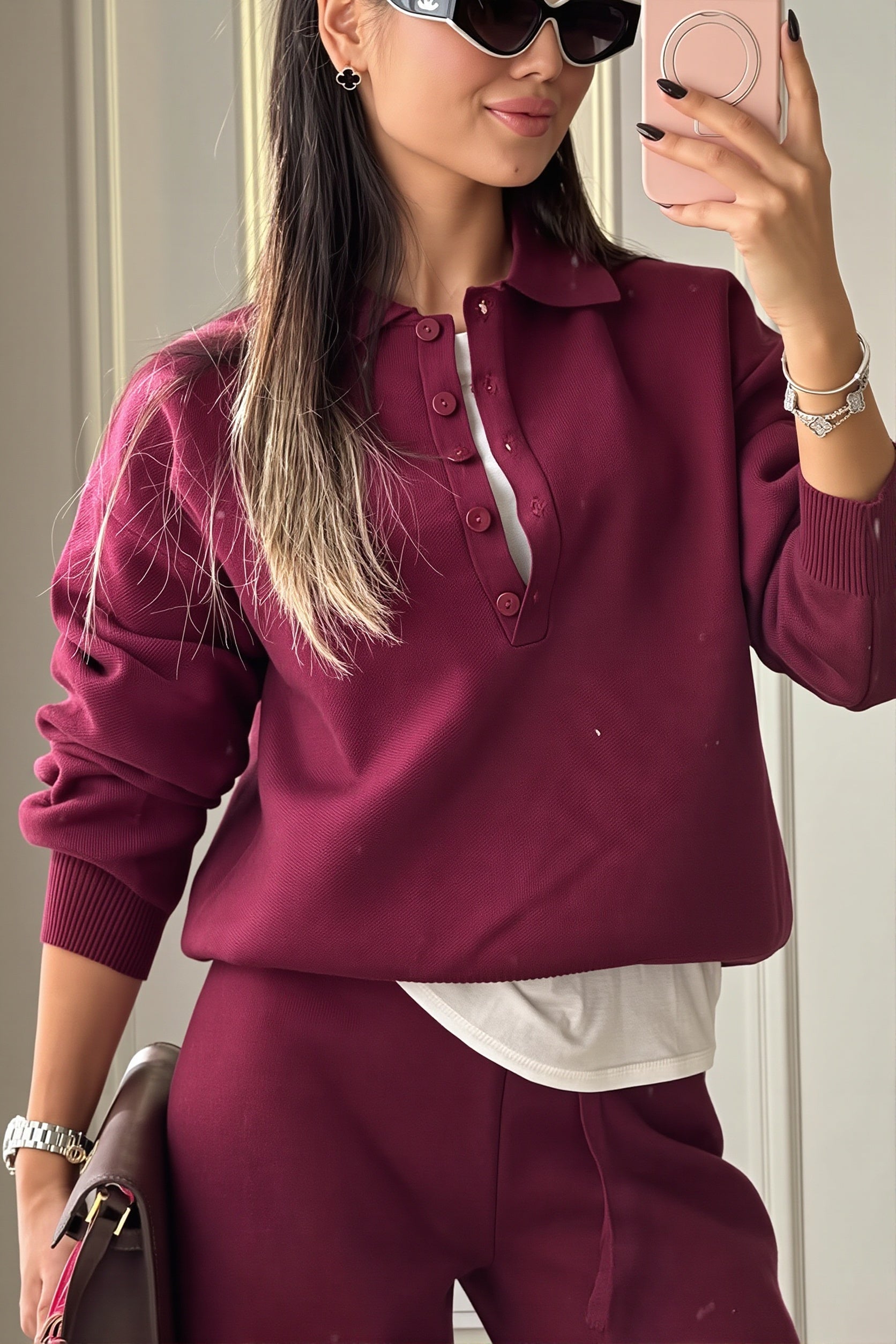 Wide-leg pants paired with a matching knit polo pullover