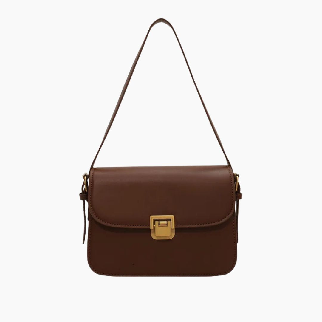 Top handle and shoulder strap detail on the women's leather bag