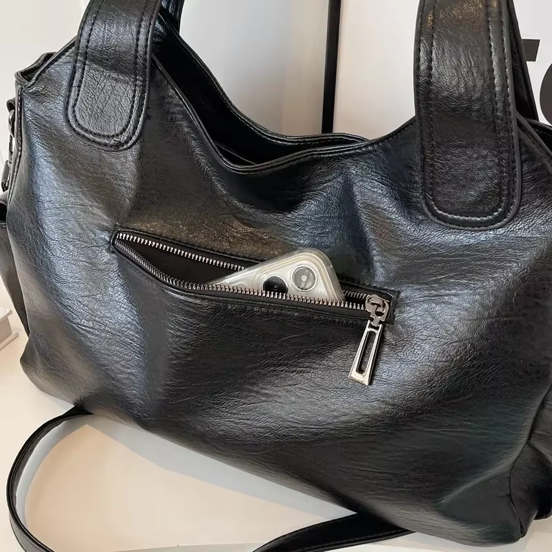 Beige everyday tote handbag full view highlighting simple versatile design