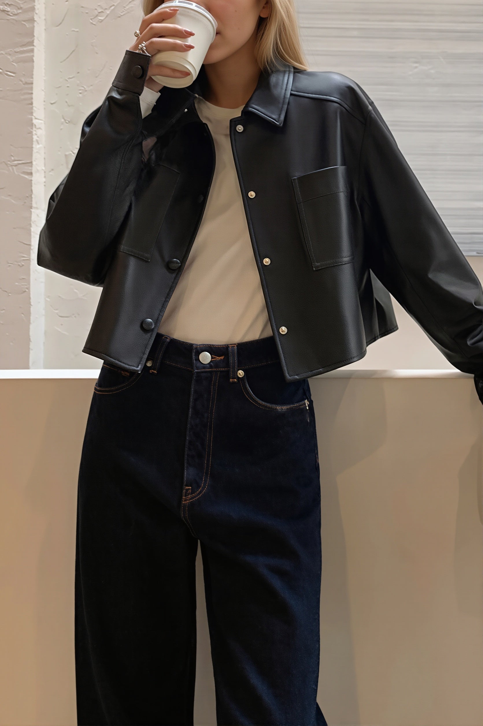 Back view of the cropped faux leather shirt jacket