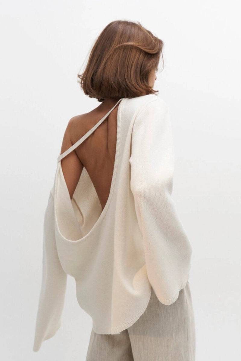 Full view of the open-back boat-neck knit sweater