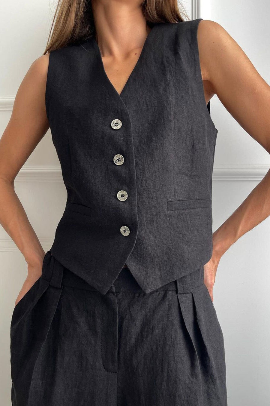 Complete two-piece outfit with vest and low-rise pants