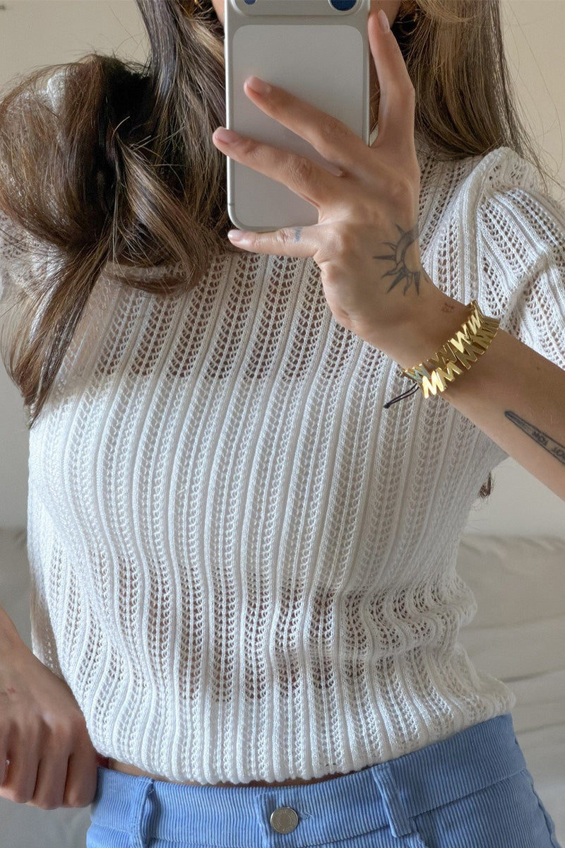 Openwork knit detail on a short-sleeve crewneck sweater