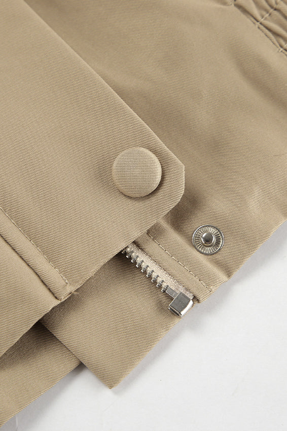 Close-up of the khaki biker coat fabric and details