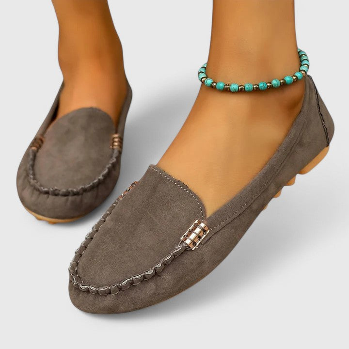 Angled view of supportive slip-on loafers for women