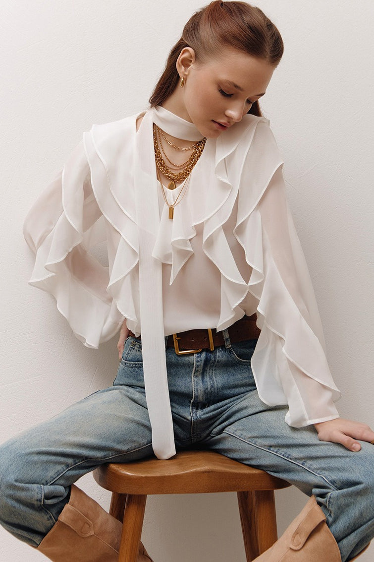 Blouse displayed with the scarf tie removed for a clean neckline
