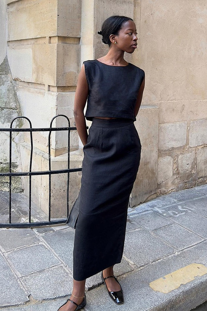 Women's linen blend vest and midi skirt set styled together