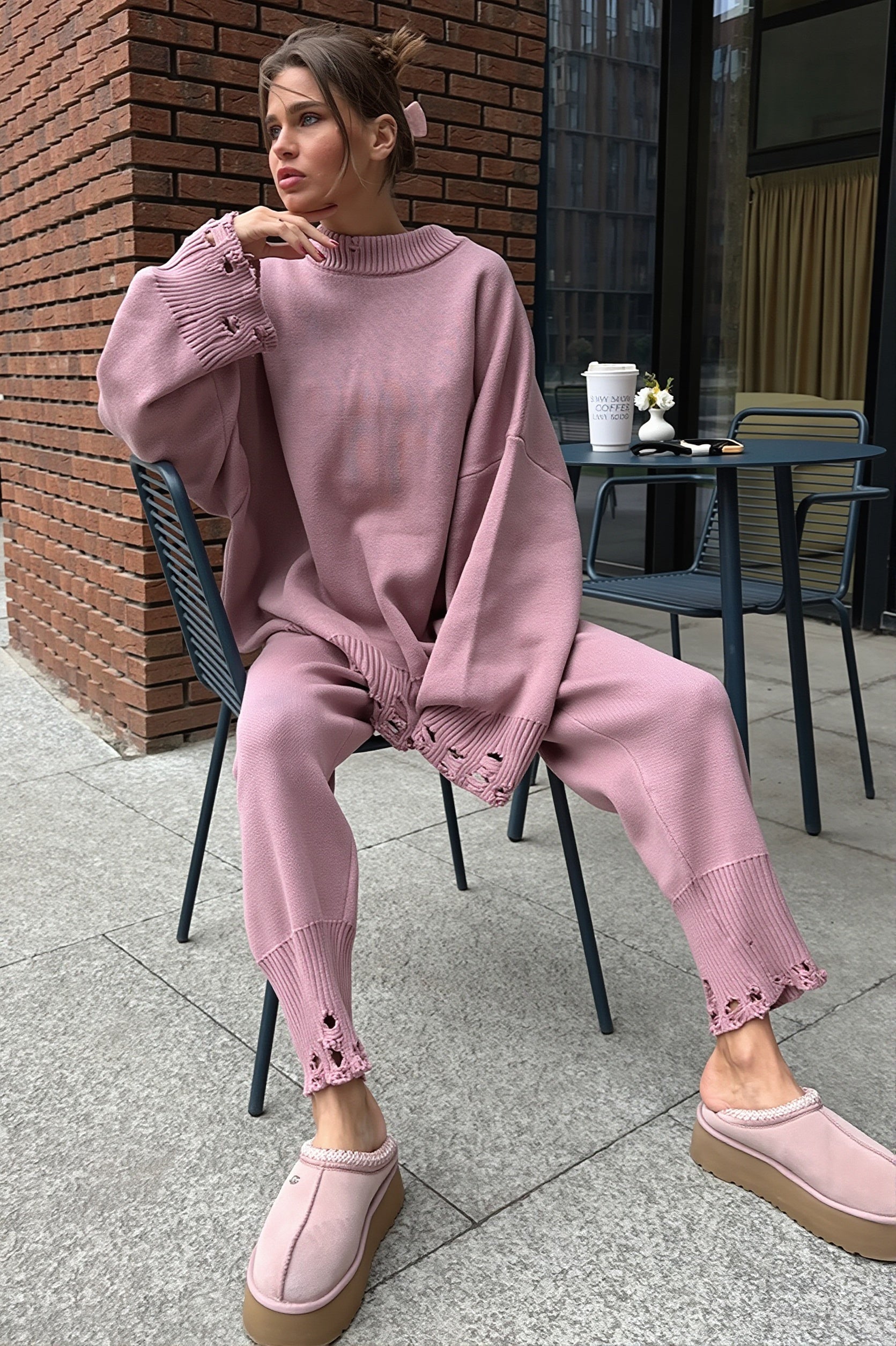 Distressed knit sweater featuring a comfortable relaxed silhouette