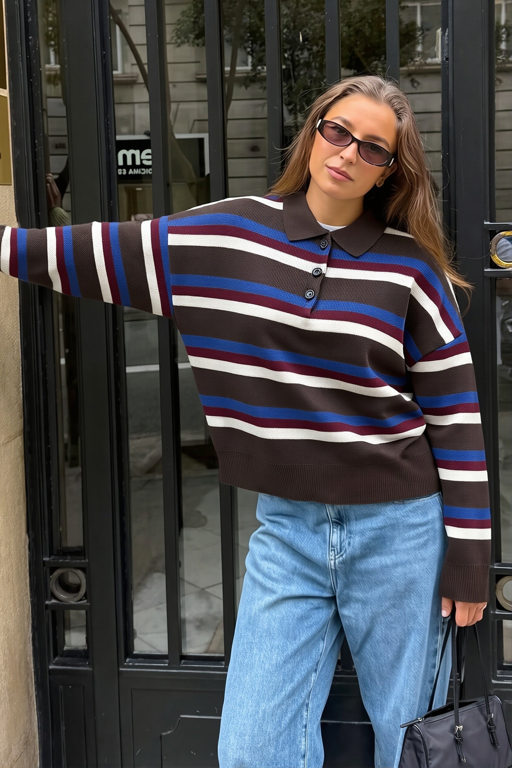 Side view of the relaxed-fit polo collar sweater