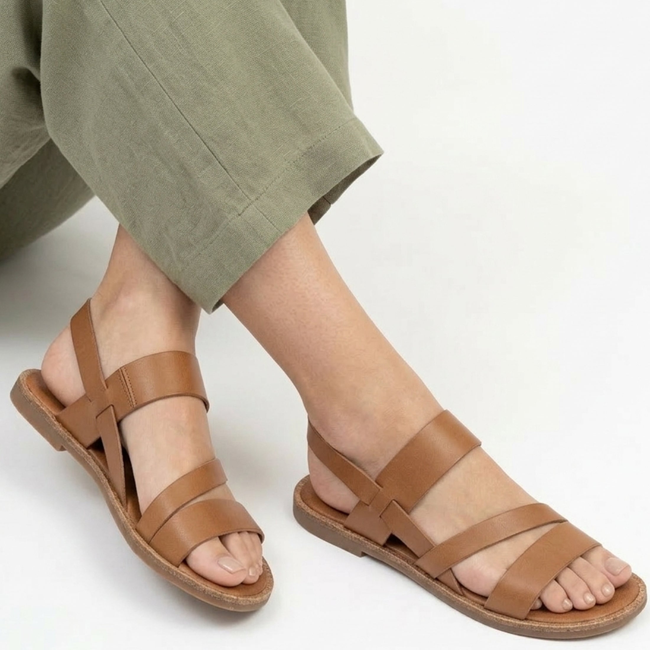 Side view of lightweight women's strappy flat sandals