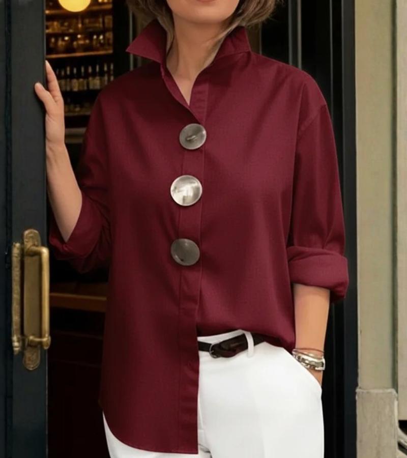 Close-up of the blouse's structured fabric and stand collar