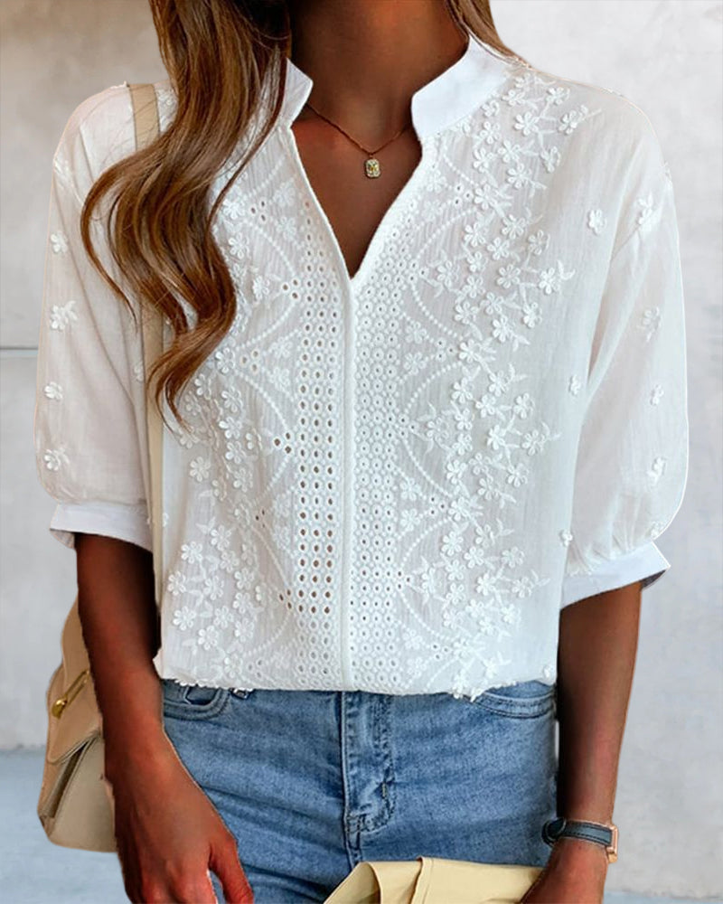 Women's blouse styled as part of a polished office outfit