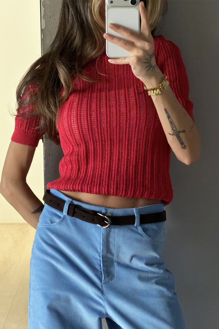 Side view of a short-sleeve openwork sweater
