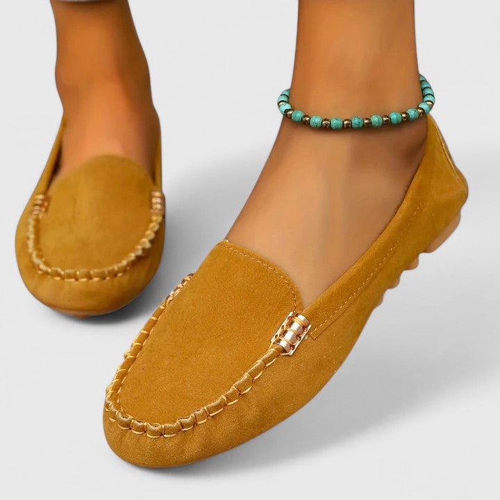 Side view of orthopedic women's loafers with metal accents
