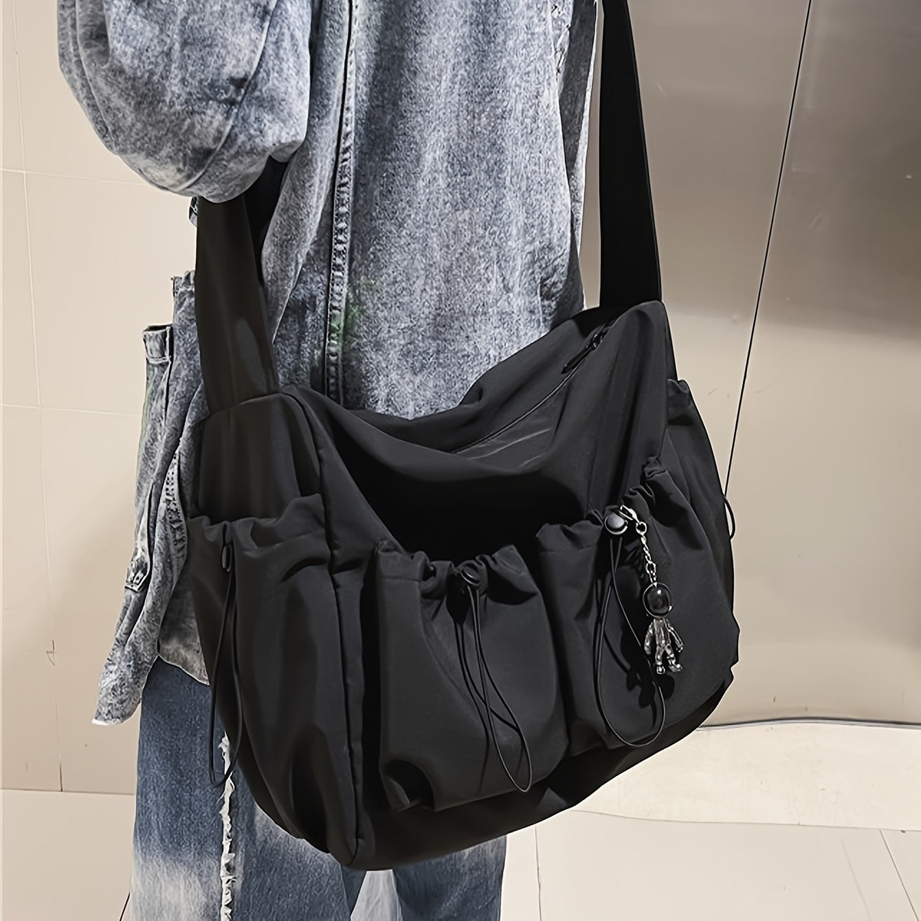 Spacious women's shoulder bag with adjustable strap and multiple compartments