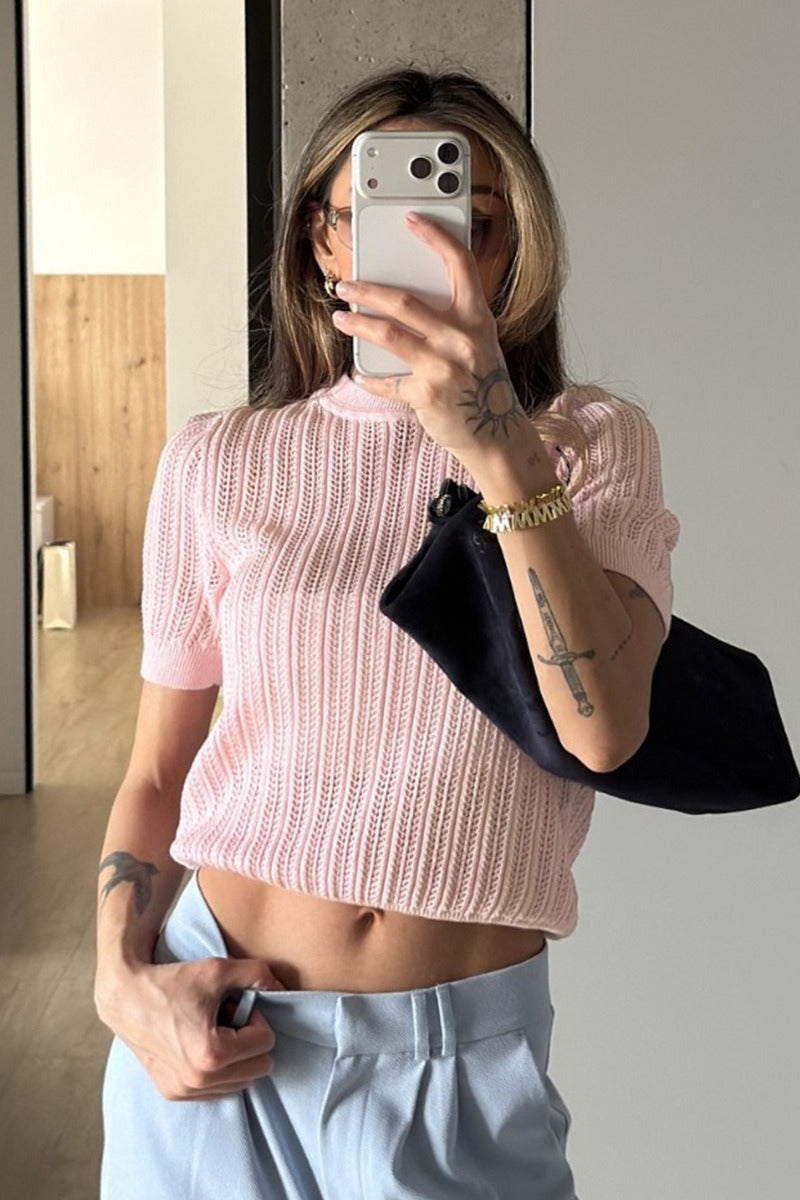 Openwork short-sleeve sweater styled for everyday wear