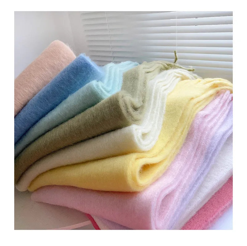 Soft scarf arranged to show its generous oversized shape