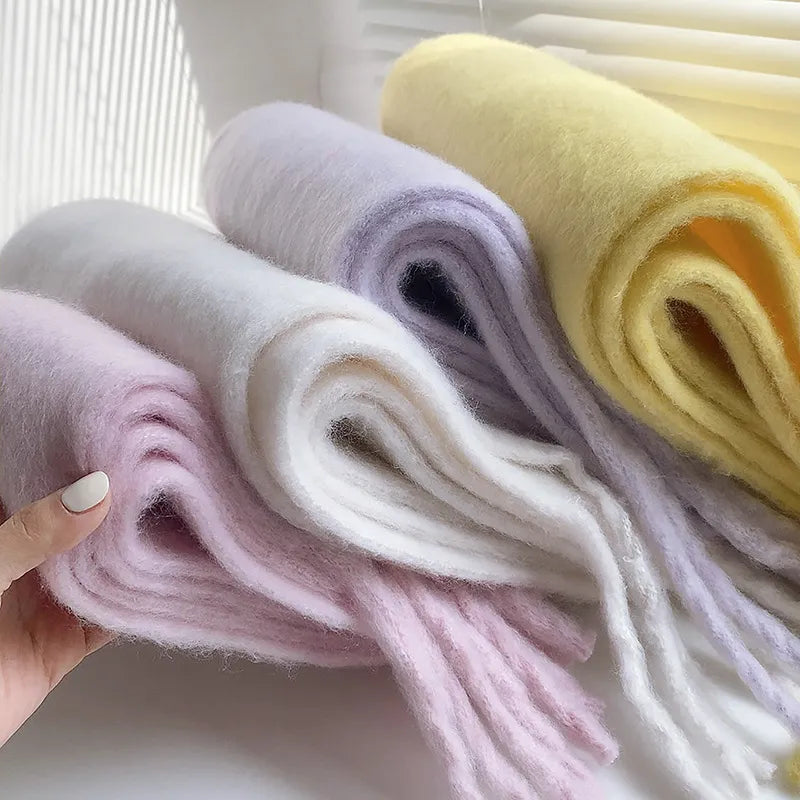 Winter scarf folded to show its soft solid-color design