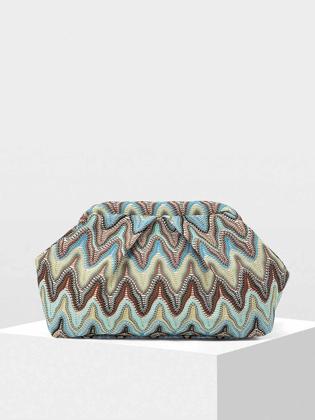 Ruched evening clutch bag with zigzag pattern shown from the front