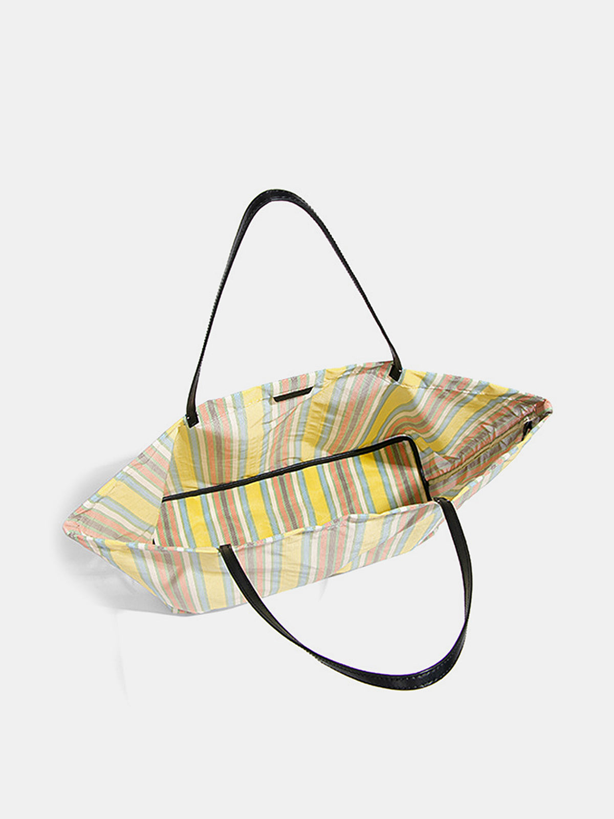 Close-up of the large rainbow stripe shoulder bag fabric and colorful striped detail