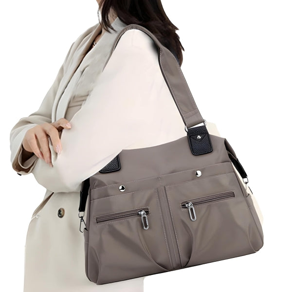 Stylish water-resistant laptop tote bag for work, travel, and everyday use