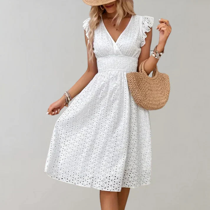 Close-up of the flutter sleeves on a women's midi dress