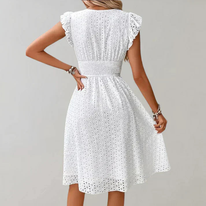 Women's midi dress styled for an elegant everyday outfit