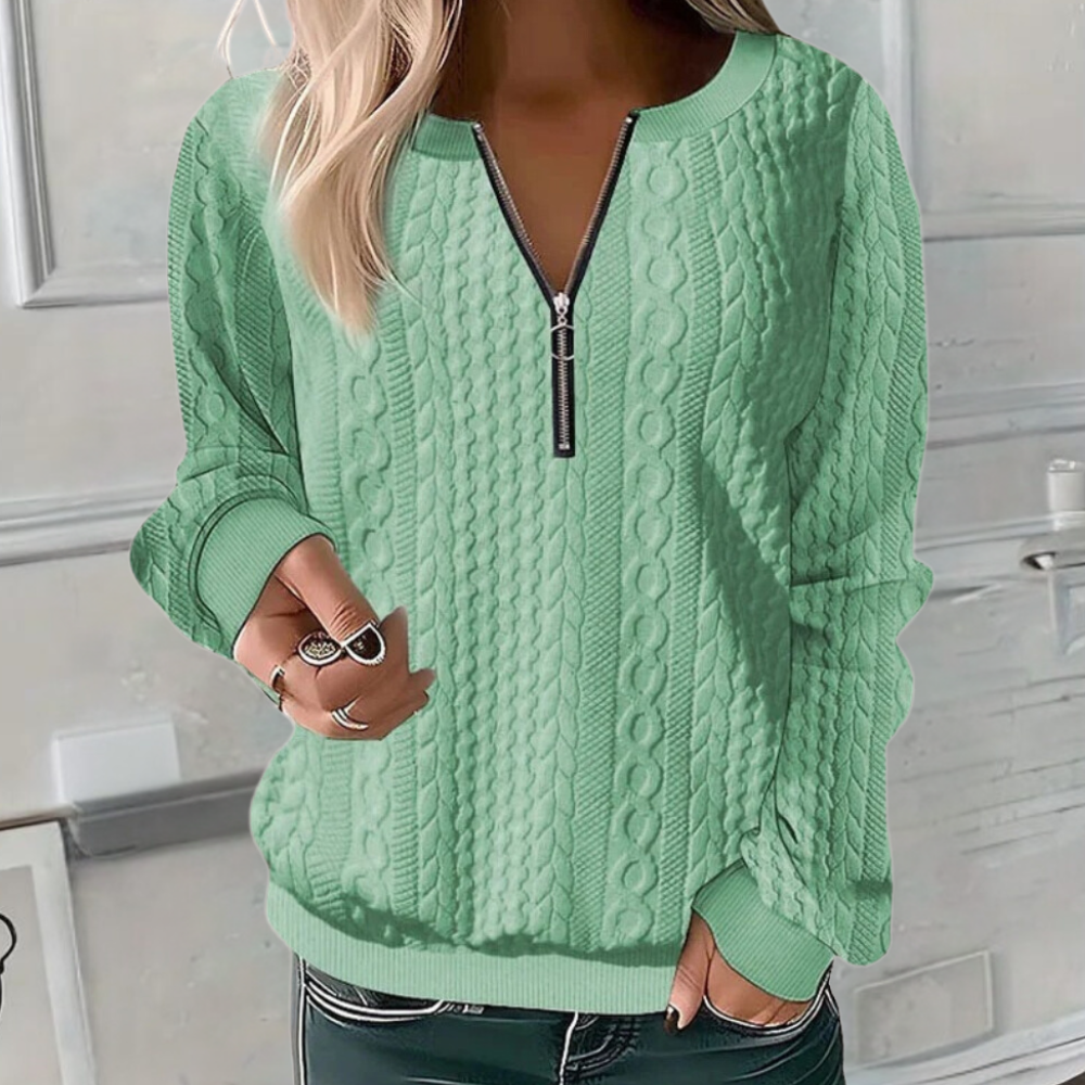 Hem detail of the women's textured knit sweater