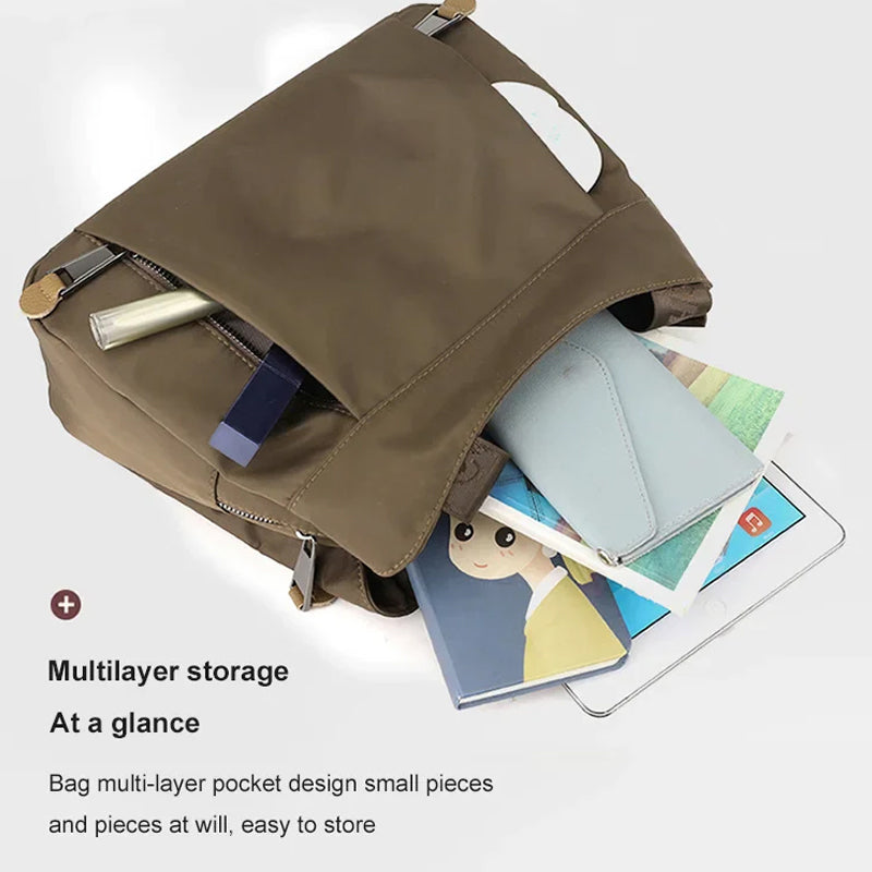 Back view of nylon crossbody bag with clean finish and adjustable shoulder strap