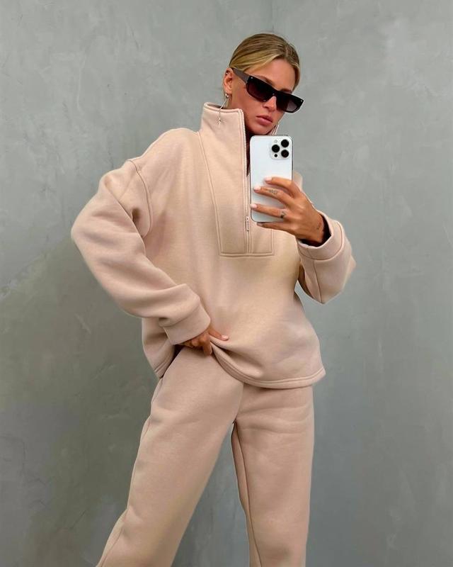 Side view of the oversized half-zip loungewear top and joggers