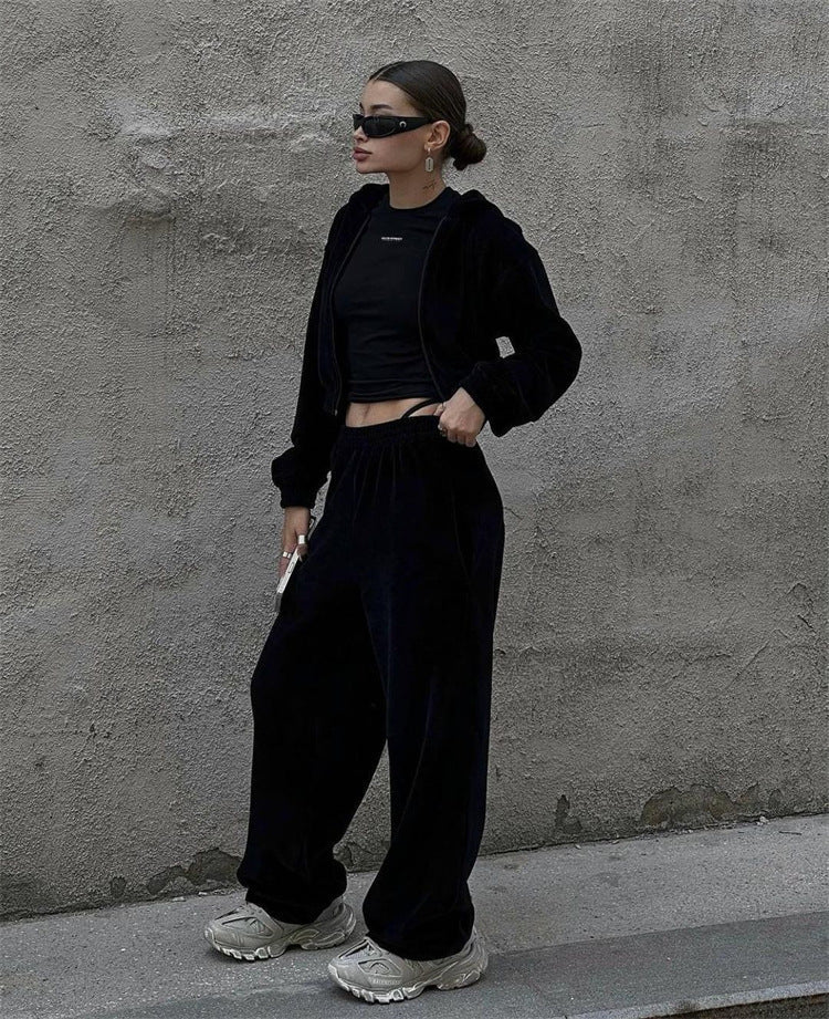 Women's cropped hoodie paired with matching high-waisted joggers